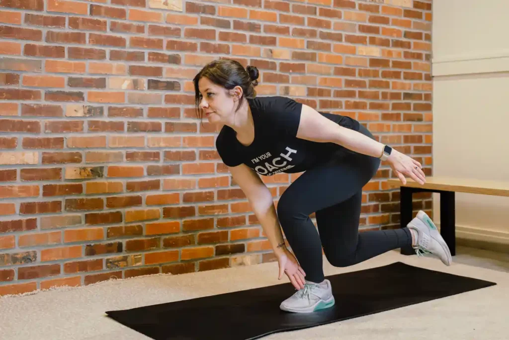 A person exercising their arms at home with light weights Camberley