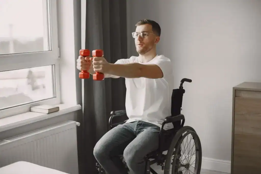 Image of man doing exercise in his wheelchair to aid weight loss Camberley