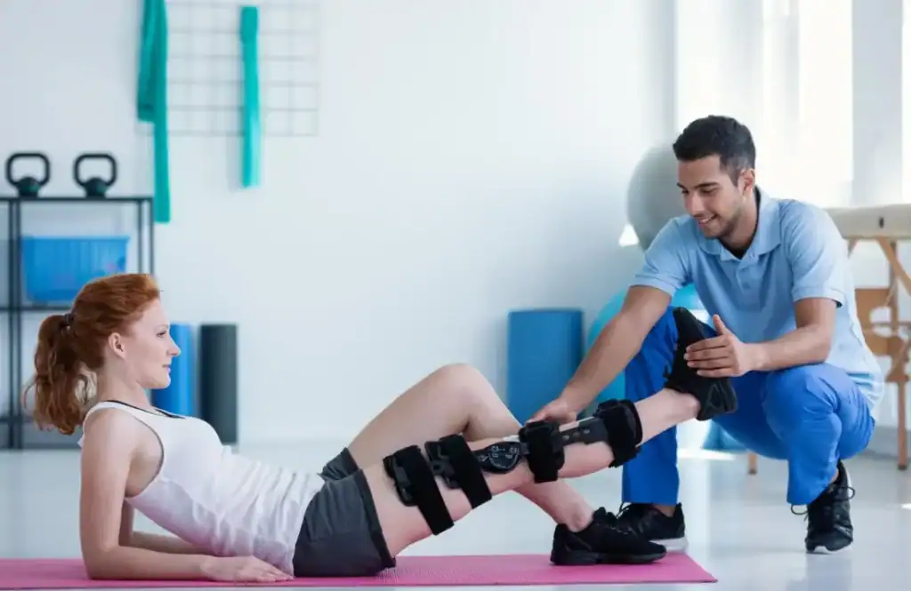 Woman having treatment to help muscle recovery Camberley after an injury