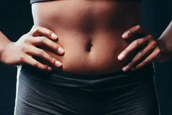 Toning Your Stomach: The Ultimate Guide to Achieving a Sculpted Stomach While Shedding Pounds 1 Image of a toned stomach after non surgical treatment Camberley